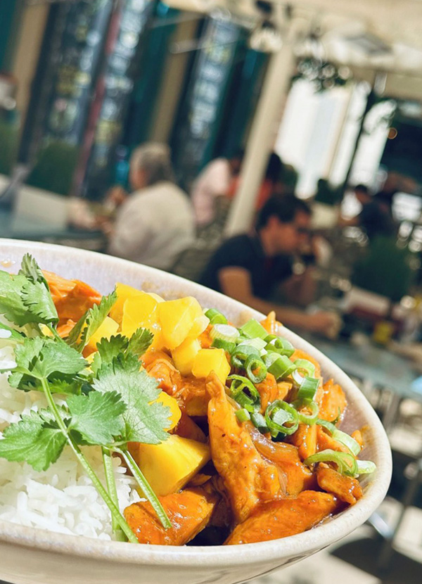 The fabulous Bun Bo terrace located beside 'The World Begins With Every Kiss' mural